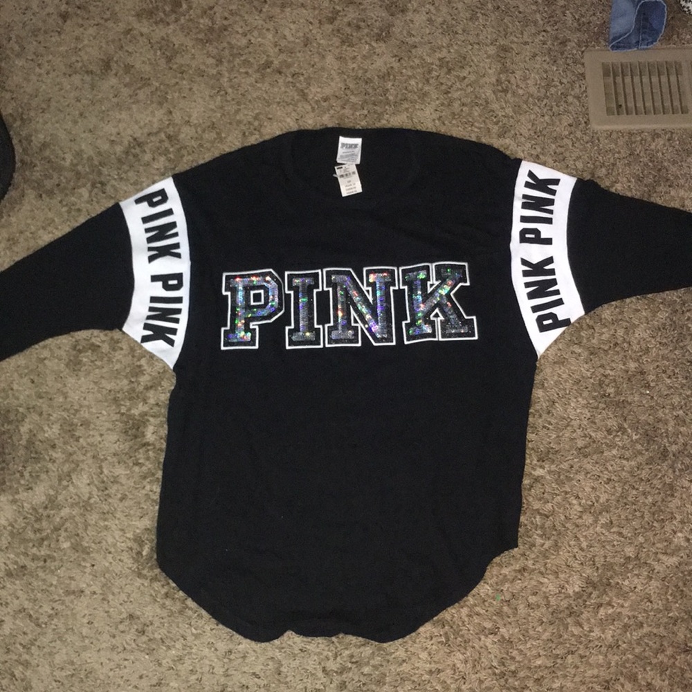 New Pink shirt size small, black/holographic logo